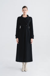 Wool wrap-style long coat with wide lapels, waist belt, and full button front closure